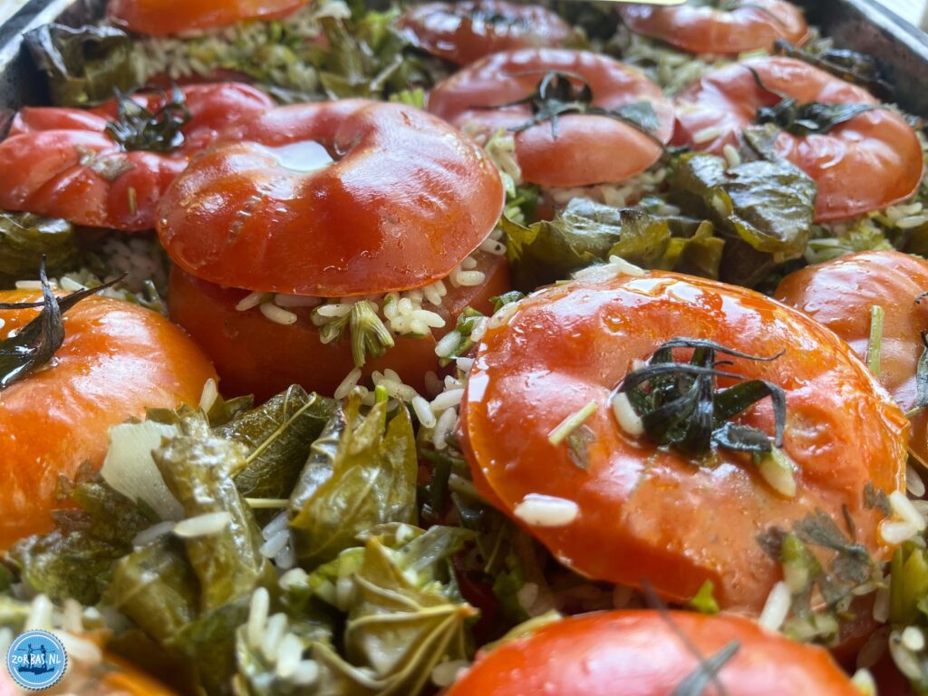 Greek stuffed tomatoes, known as gemista or yemista, are a classic summer comfort food. Large, ripe tomatoes are hollowed out, filled with a fragrant mixture of rice and fresh herbs, and slow-baked in an olive oil and tomato juice sauce