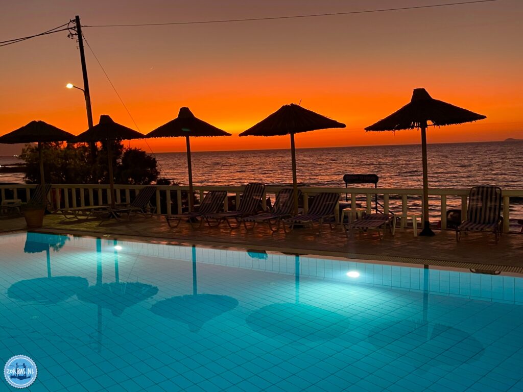 Enjoy a beautiful sunset from the terrace of Zorbas Island in Kokkini